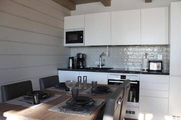 Фото номера Улучшенные апартаменты с сауной Курортные отели Naava Chalets г. Эхтяри 22
